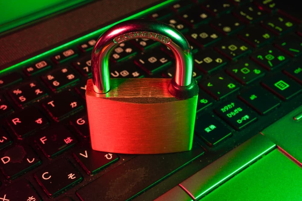 Padlock resting on a backlit keyboard